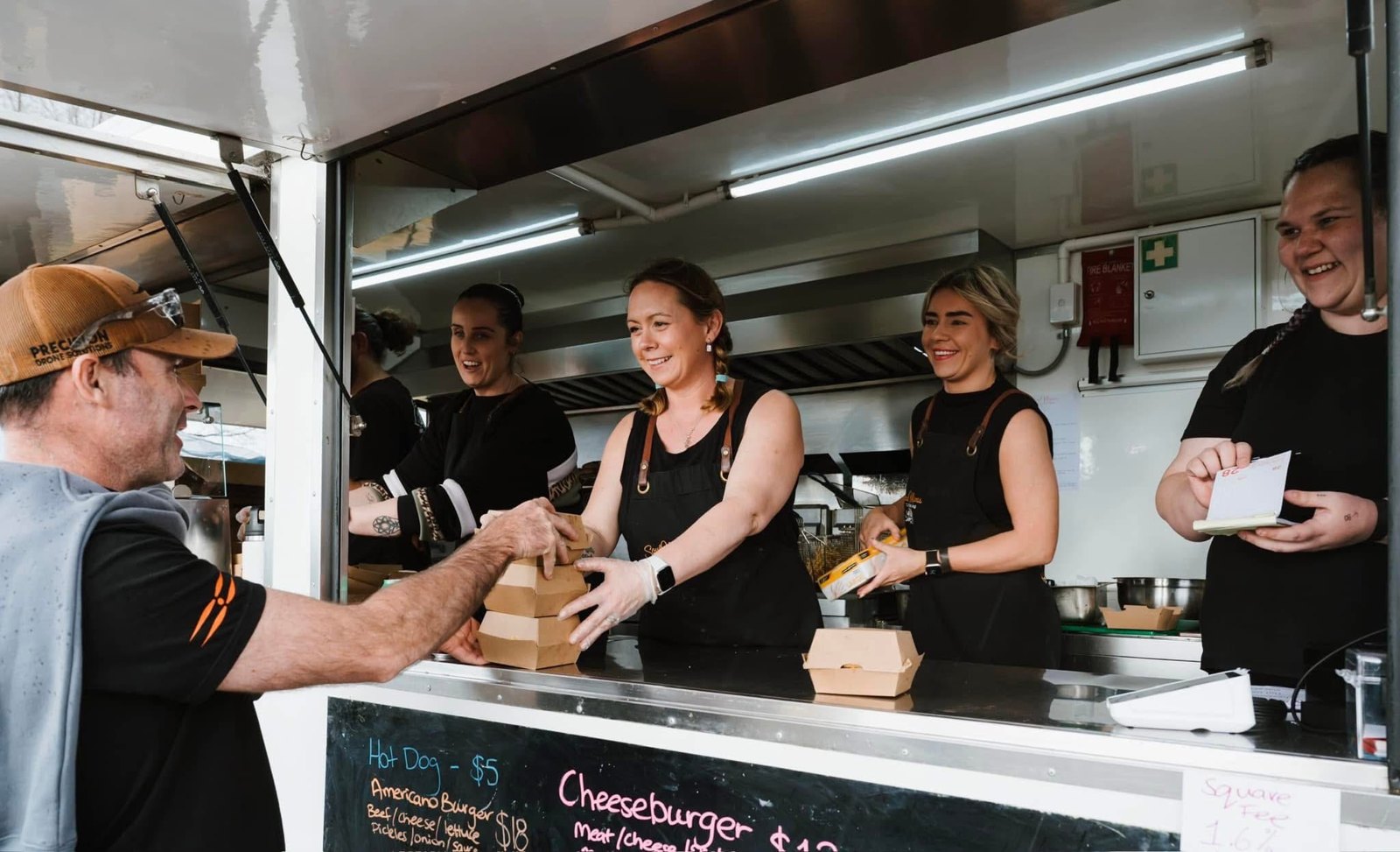 The Soul Mamas crew serving from the food van